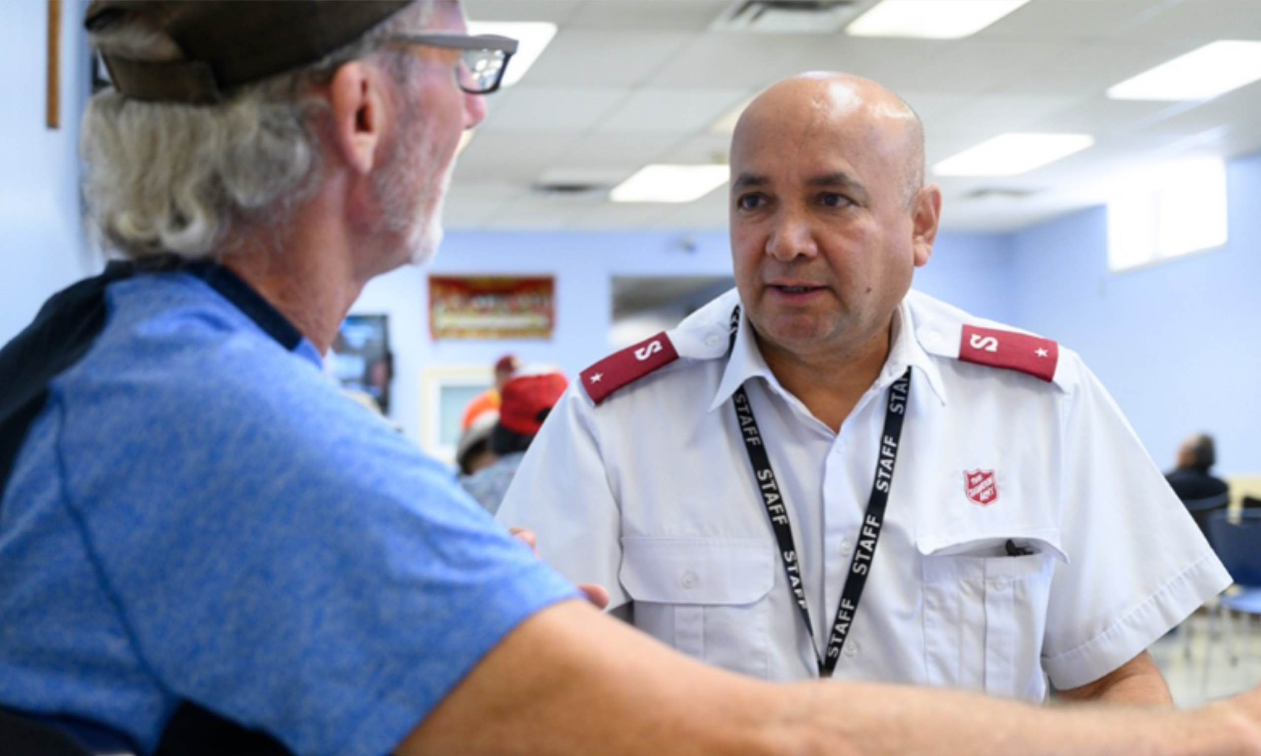 Salvation Army worker with client