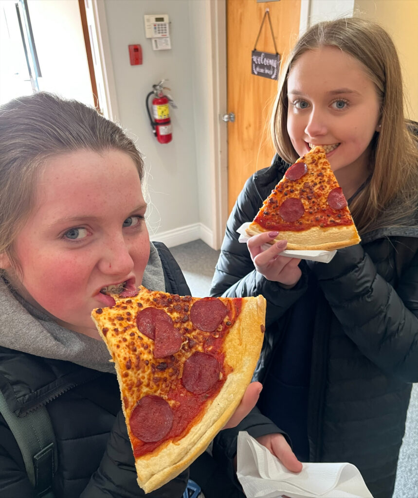 Students, Slices, and Smiles: Parking Lot Pizza Creates Caring Space for Local Youth