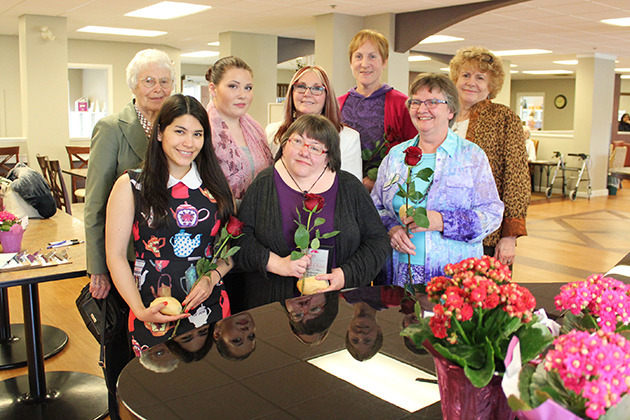 Dedicated volunteers were honoured at the 26th annual Bread and Roses Celebration on Wednesday. Grace Bryant (front, centre) was selected as Volunteer of the Year for her work with the Chilliwack Salvation Army.— Image Credit: Sam Bates