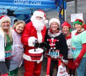 Participants , with Santa, in festive gear