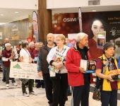 People line up to donate toys for toy mountain