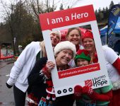 Participants photo with sign "I am a Hero"