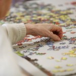 a man doing a puzzle
