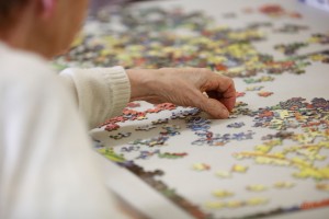 a man doing a puzzle