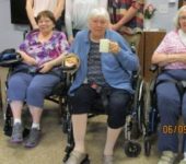 4 elderly woman drinking tea