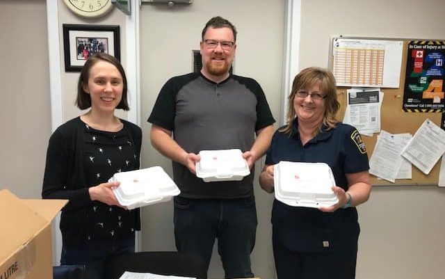 A photo of three individuals who participated in the lunch fundraiser