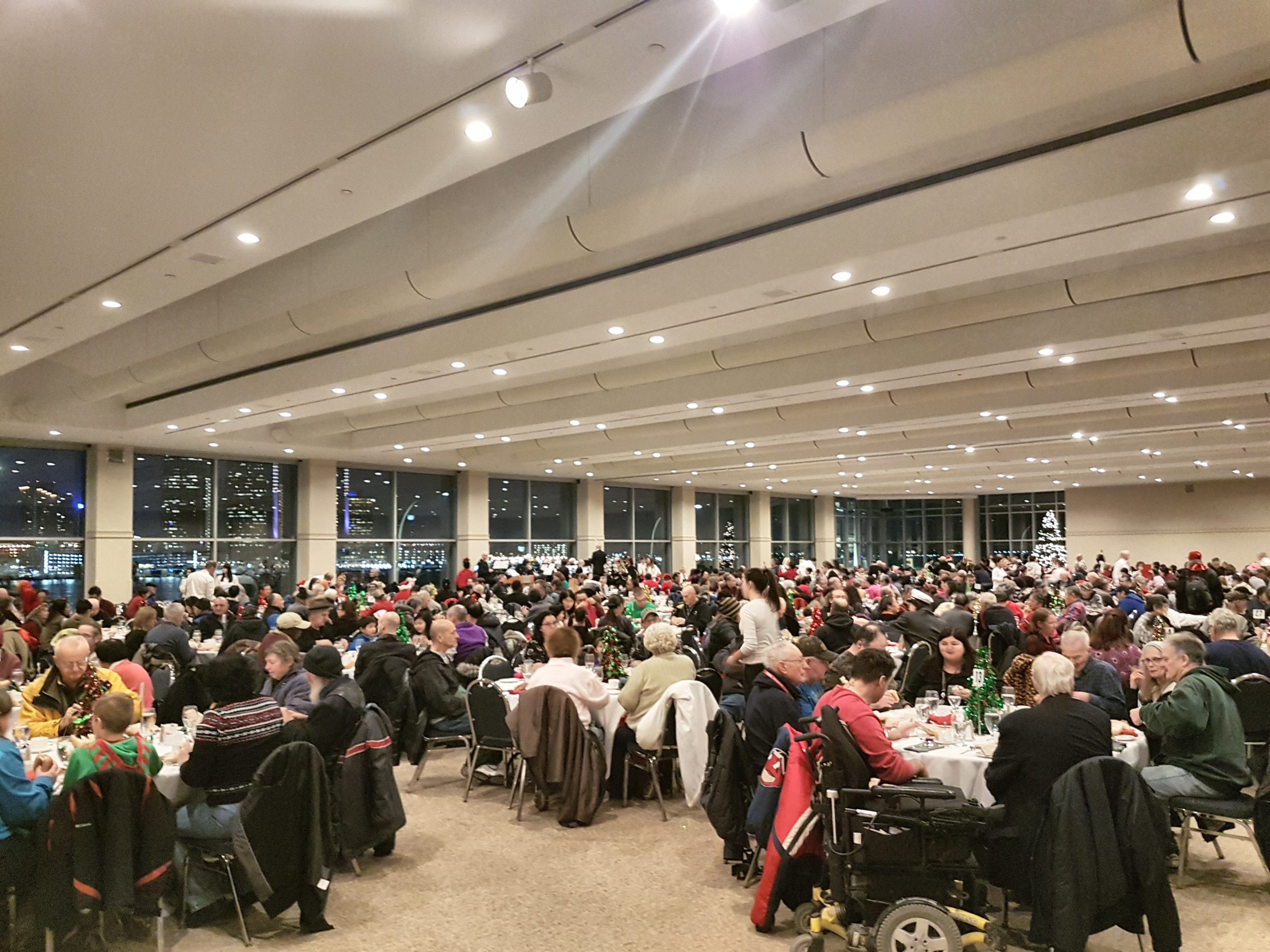 Annual Xmas dinner: a group of people in dining hall