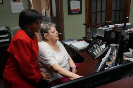 Connie and Beverly at the reception desk at Divisional Headquarters