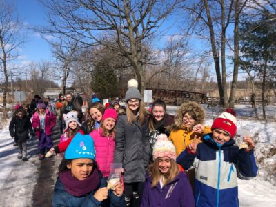 A photo of the group of campers from Oshawa Temple out on their nature walk.