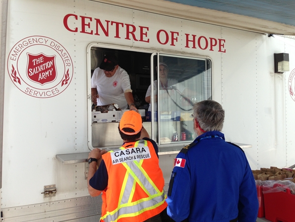 A Salvation Army Canteen truck serves first responders on scene at a disaster.