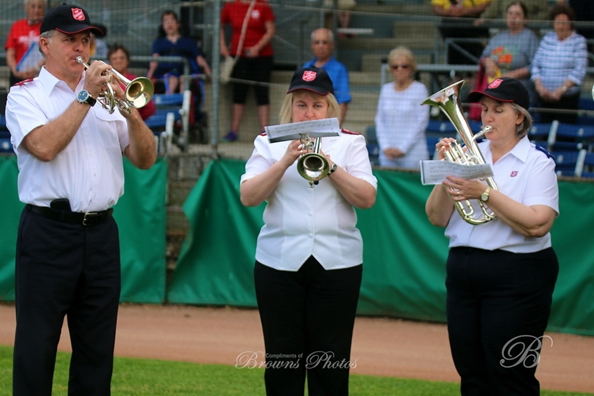 Band Members Capt Mark Hall, Major Glenda Davis, Carol Walkling play the National Anthem