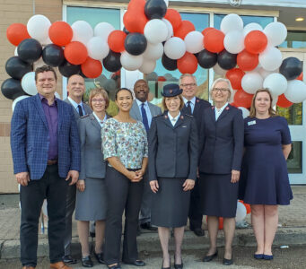 Special Guests pose for a photo after cutting the ribbon. From left to right: MLA James Teitsma, Majors Rodney and Paulette Bungay, City Councillor Markus Chambers and Vivian Santos (Acting Deputy Mayor), Commissioner and Territorial Commander Susan McMillan, Majors Shawn and Brenda Critch, The Winnipeg Foundation's Megan Tate. Photo Credit: Blair Malazdrewich