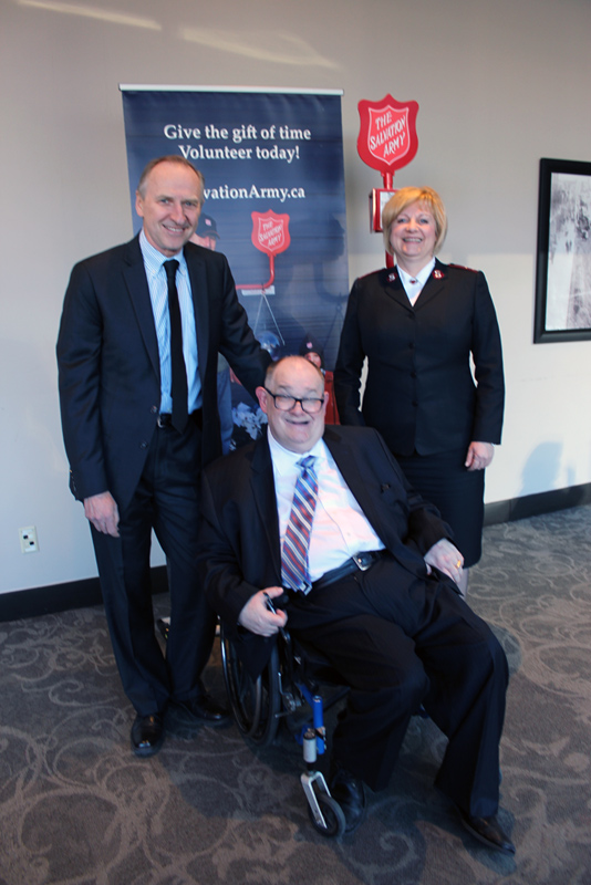 Emcee Bruce Bowie, guest speaker Cam Tait, and Captain Pam Goodyear.