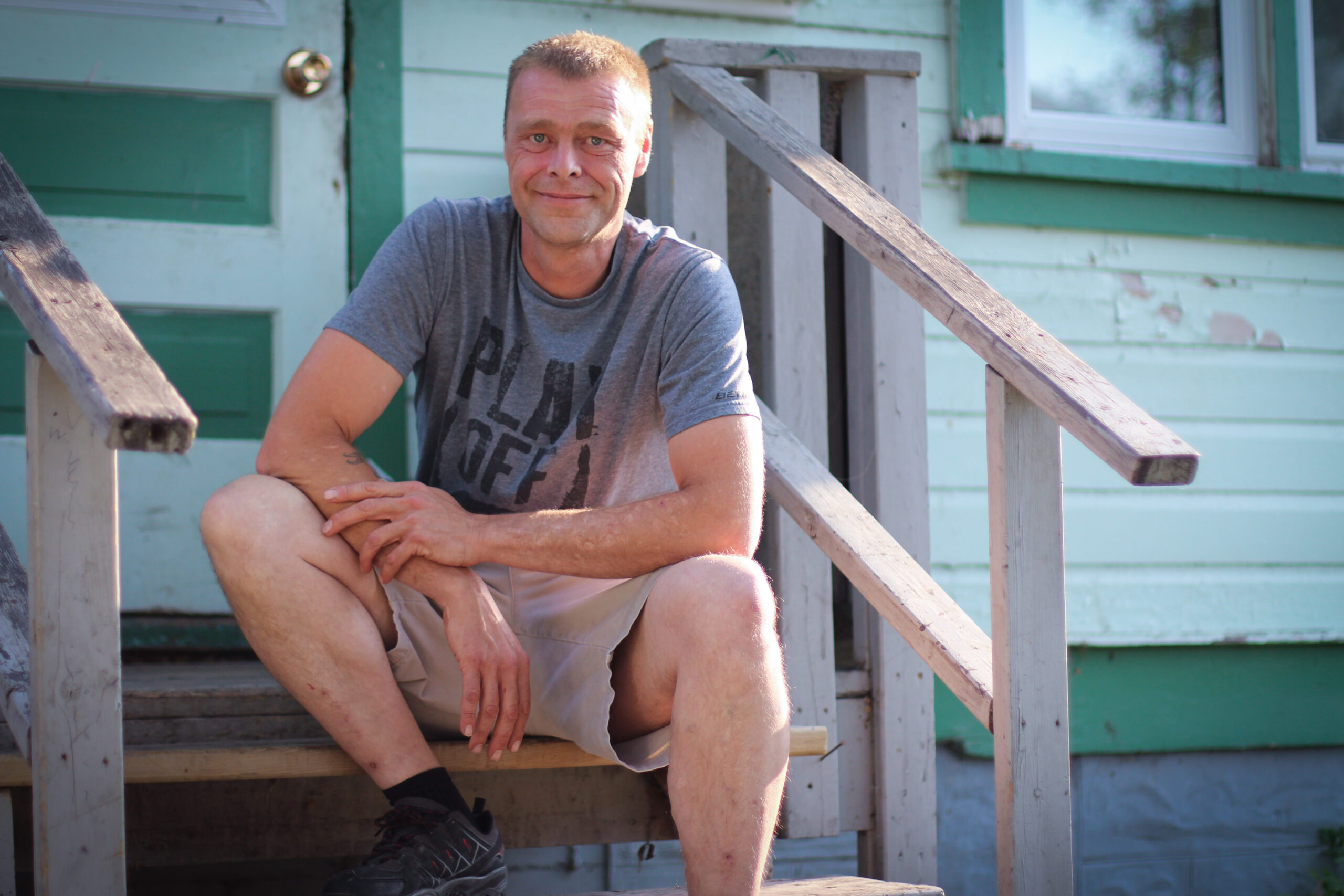 Man posing on steps