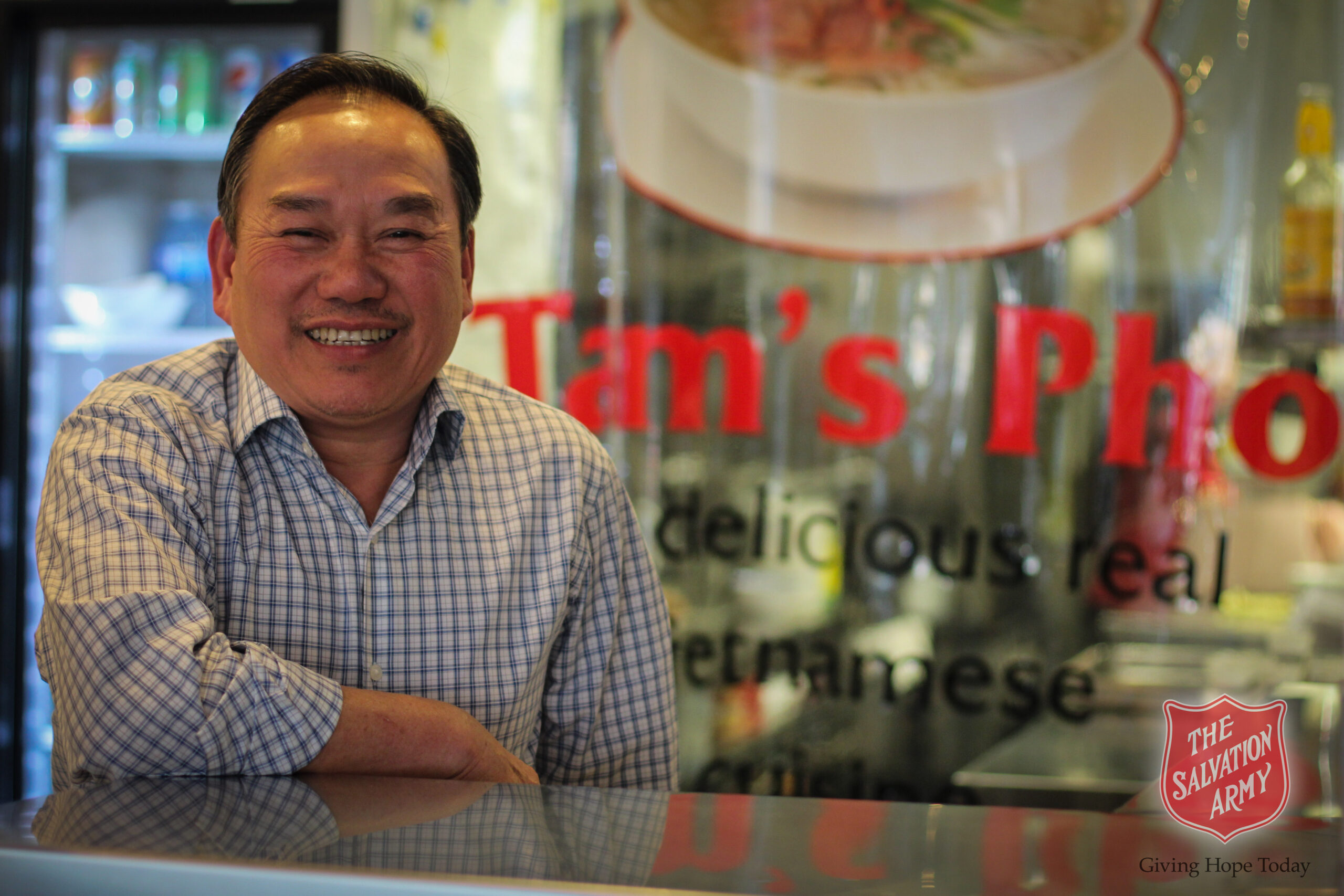 Photo: man posing at Tam's Pho restaurant
