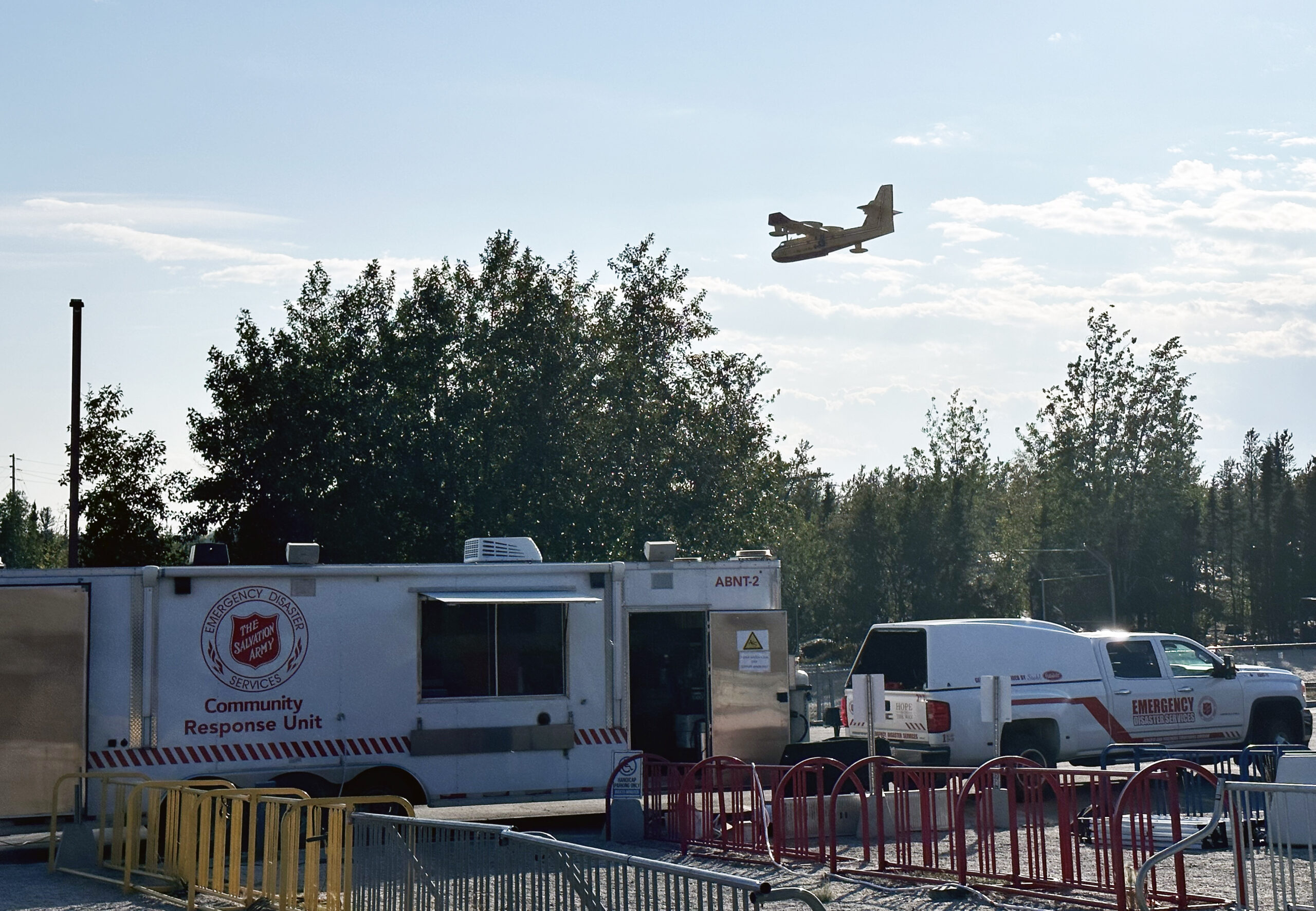 A plane flies over the EDS camp in Yellowknife