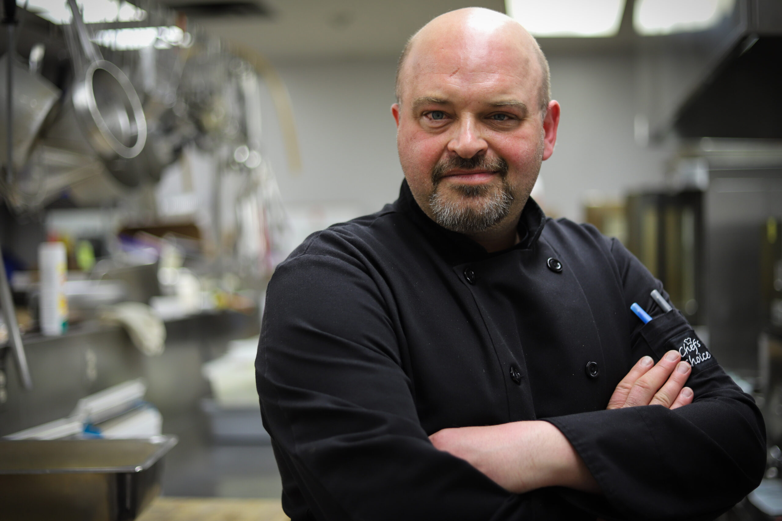 man posing in kitchen