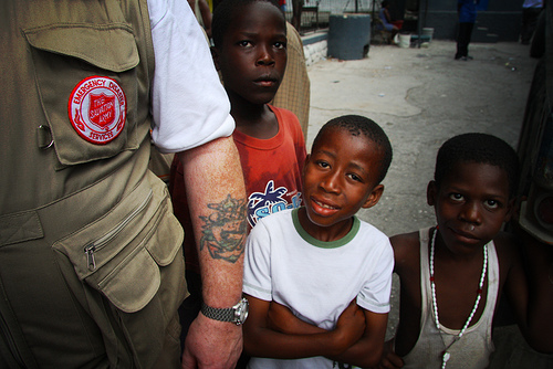 EDS worker and children in Haiti