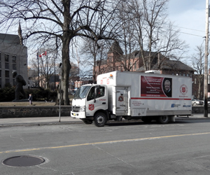 Maritime Cold Weather Street Ministry program van parked on Spring Garden Road offering hot food and drinks to homeless people