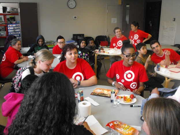 Target team members help with activities at Salvation Army after-school reading program