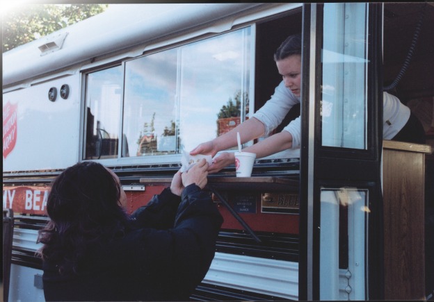 Salvation Army mobile street van serves food and drinks to vulnerable people