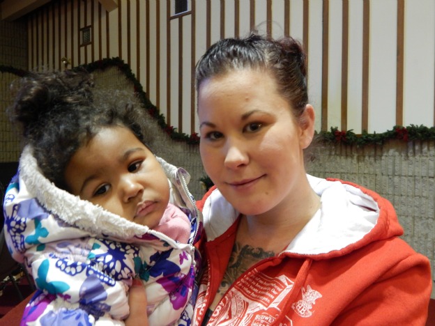 young mother with child get assistance from Salvation Army in Agincourt