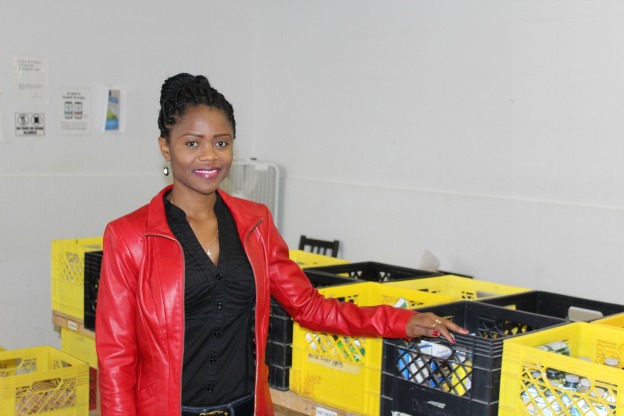 homeless woman sorts food at Salvation Army family services