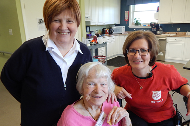 London village staff and participant at Alzheimers Day program