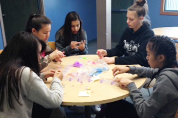 At-risk youth make crafts at drop-in program