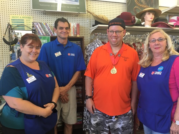 Special Olympian Kyle Weaver (second right) feels part of the family at The Salvation Army Thrift Store National Recycling Operations (NRO) St. Catharines location with the support of team members Linda Book (right), store manager Mike Nitsch (second left) and Dawn Goodnough (left).