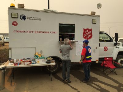 An EDS van serving people at a disaster site