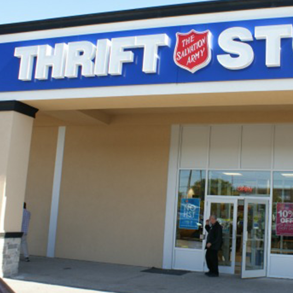 Thrift Stores- an image of a man exiting a Salvation Army thrift store