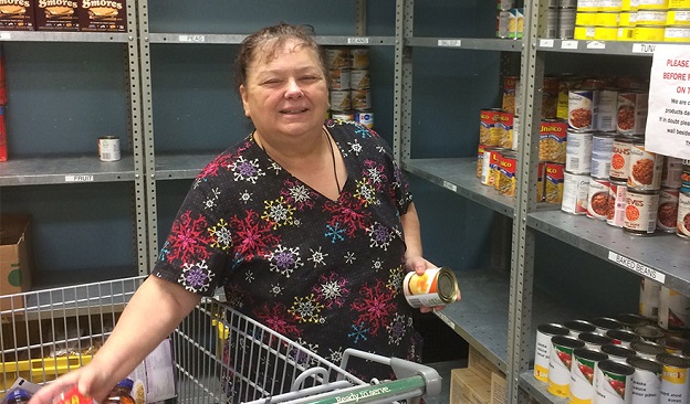 Marg stocks food shelves for Christmas hamper program