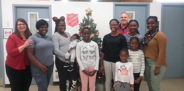 Bernadette and family with Salvation Army workers in Oshawa, Ont.