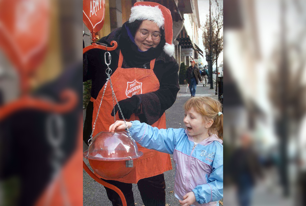 Little girl donates to Salvation Army kettle