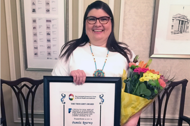 Pamela holds award for her work in the field of mental health