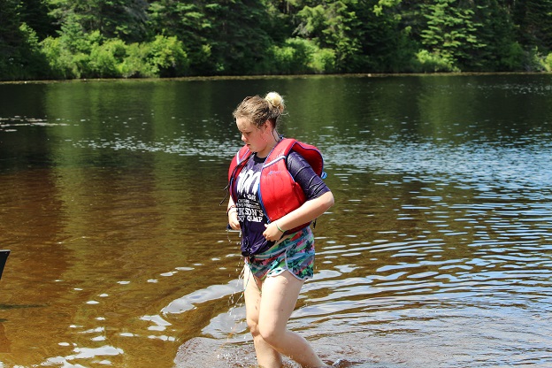 Former camper, Emily, enjoys the outdoors at leadership camp