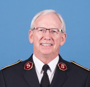 General Brian Peddle smiling for the camera