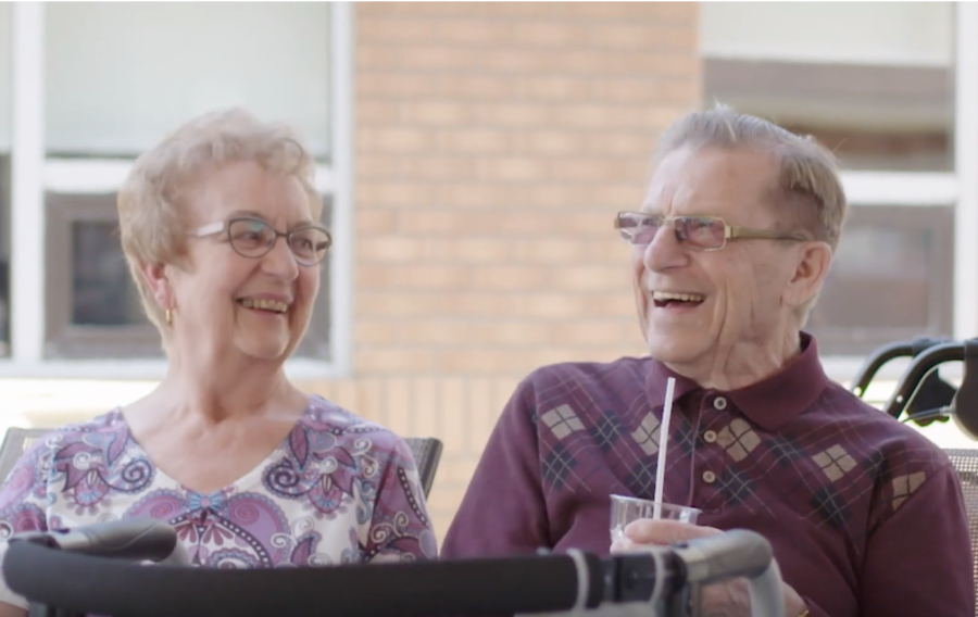 Elderly couple laughing and having fun
