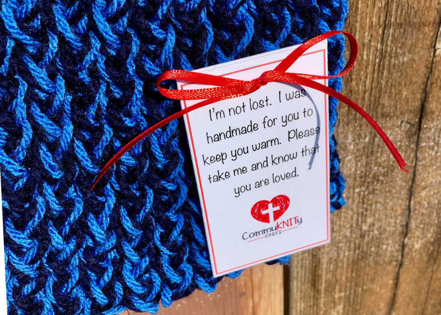 Handknit scarf says "I'm not lost. I was handmade for you to keep you warm. Please take me and know that you are loved."