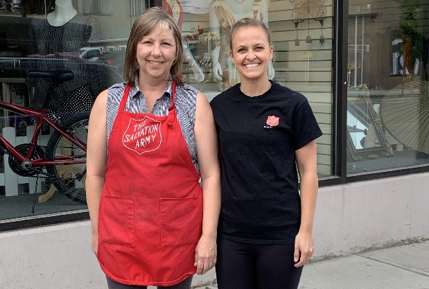 Tracy, left, volunteers at Salvation Army thrift store supported by Jenn Thompson, right, program coordinator of women's support group