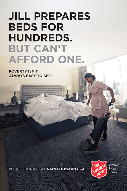 Salvation Army Canada winter 2018 2019 campaign ad. Jill, a hotel maid, is vacuuming a room. The ad reads: Jill prepares beds hundreds. But can't afford one. Poverty isn't always easy to see. Please donate at salvation army dot c a. The Salvation Army. Giving hope today.
