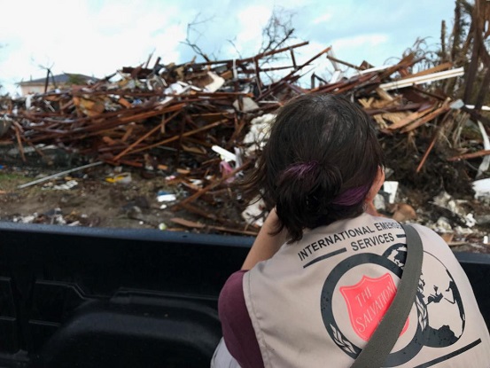 Carolynn Barkhouse surveys the damage from Hurricane Dorian on Abaco Island