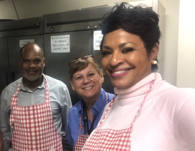 Roydell (right) volunteers at Salvation Army soup kitchen