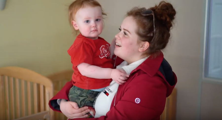 mother holding child