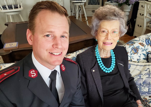 Jamie Locke (Salvation Army public relations) sits with Martha Jodrey