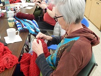 Phyllis knits scarves