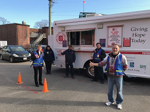 Salvation Army personnel gear up to feed shelter residents
