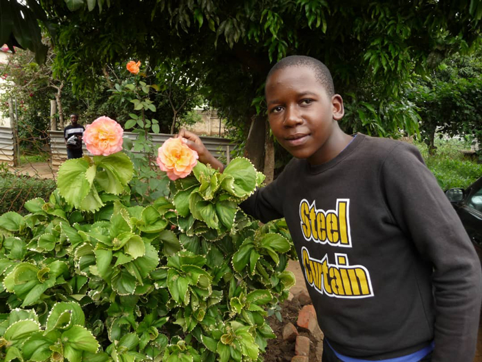 Emmanuel with flower