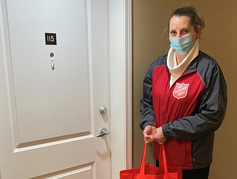Salvation Army worker delivers hampers to fire victims